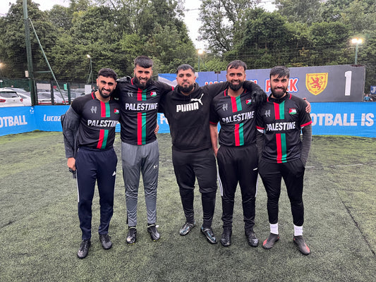 5 men on a 5-a-side football pitch in Glasgow